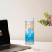 Tumbler on a desk beside a laptop – perfect for work, study, or dreaming of your next beach day.